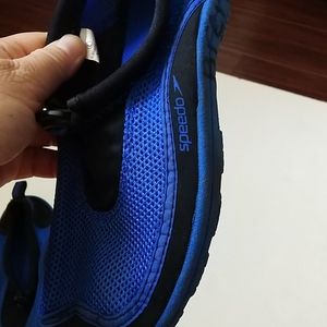 Speedo water shoes size large.